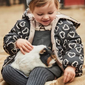 Chaquetón reversible estampado bebé