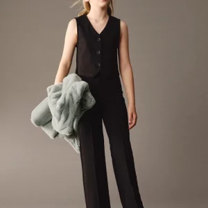 Conjunto pantalón y chaleco chica